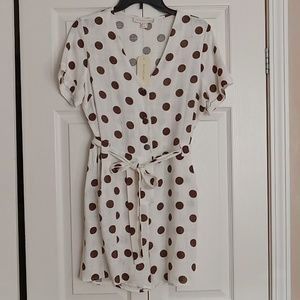 Very cute rompers with pockets and wrap around belt.